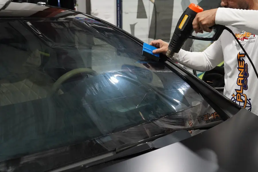 Window tint detail on a car door