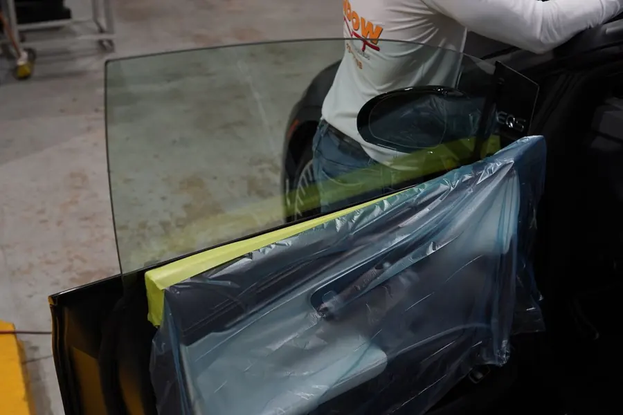Tint film work on a vehicle