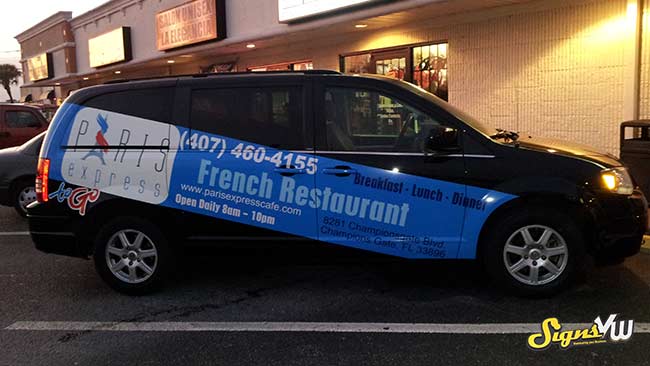 Van wrapped partially wrapped with Paris Express advertising